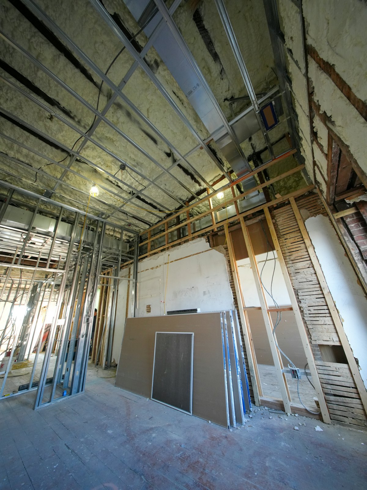 Interior renovation with metal studs and drywall sheets